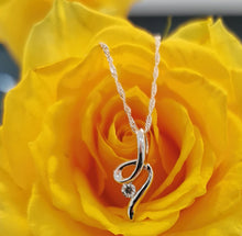 Load image into Gallery viewer, Silver Cubic Zirconia Twist Necklace
